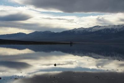 In January 2011 the lowest point in North America (Badwater Basin, Death Valley, CA) is a shallow lake rimmed by snowcapped peaks. This exemplifies the complex topography in the western U.S. where refined resolution improves modeled precipitation.