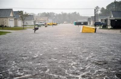 Image of a flooded residential street. 