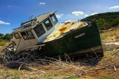 Boat on dry land.