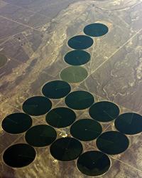 With irrigation, growing thirsty alfalfa in the desert is possible. Yet, extensive reliance on irrigation means that depletion of surface water or groundwater sources is more than likely a consequence, especially in the face of climate warming. Researchers are finding ways to capture the total hydrological picture in Earth system and land surface models, to understand the impact of irrigation on regional drought vulnerability.