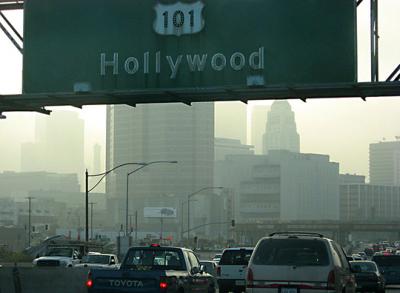 Photograph of Los Angeles traffic, with pollution visible in sky.