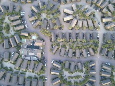 The new houses and commercial buildings needed to accommodate a growing population result in significant changes in electricity consumption that utilities must address.